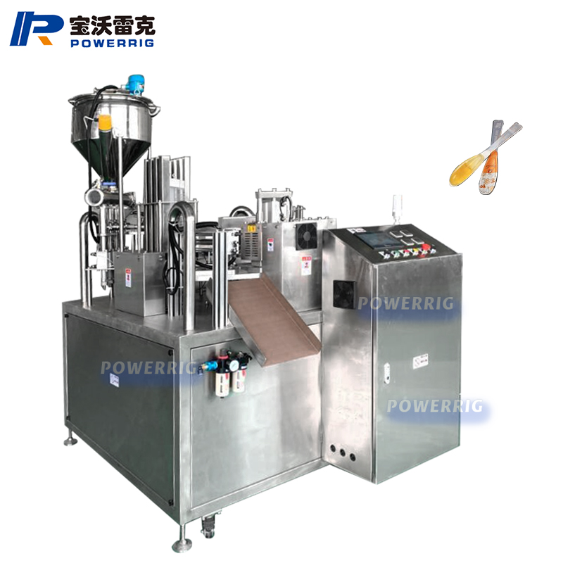 自動旋轉(zhuǎn)蜂蜜勺灌裝機